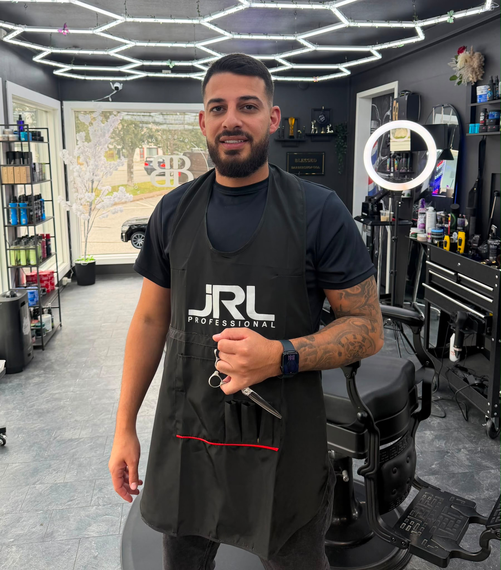 Alaa, barber at Blessed Barbershop