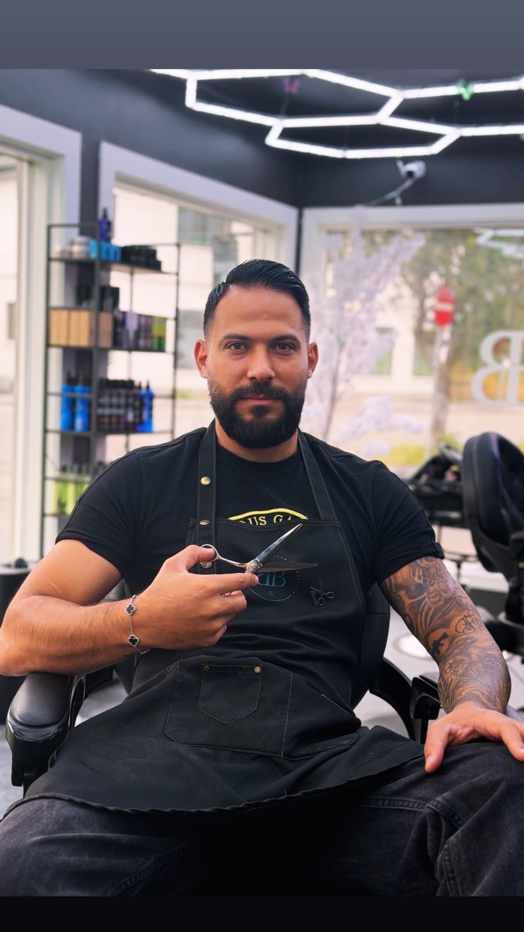 Hussein, barber at Blessed Barbershop