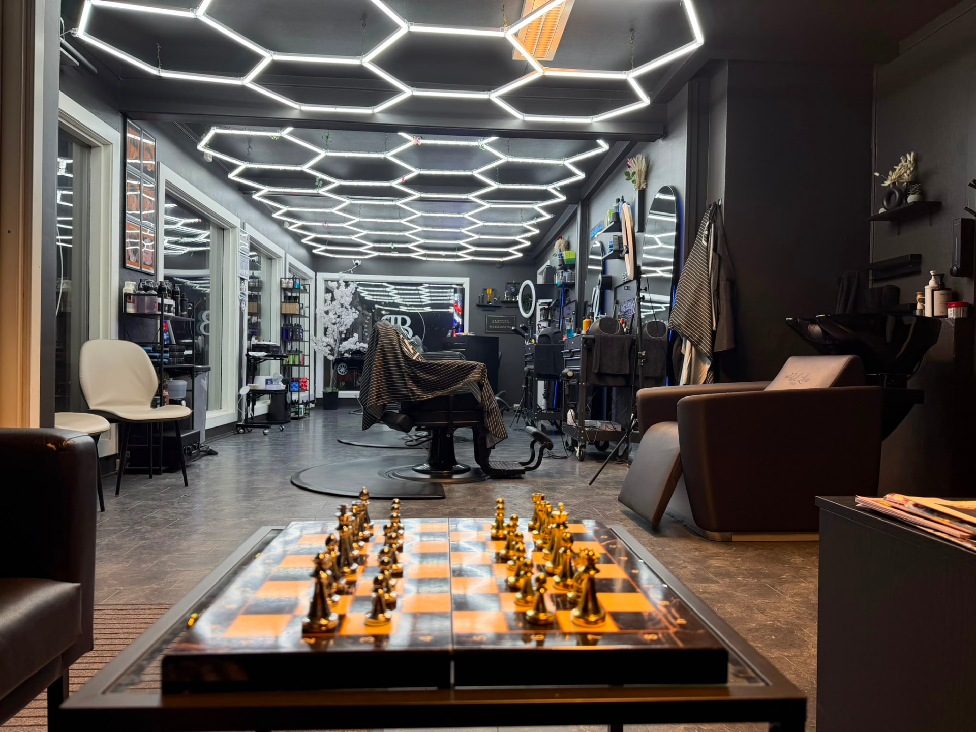 Interior of Blessed Barbershop in Gol with hexagon lighting and a barber chair